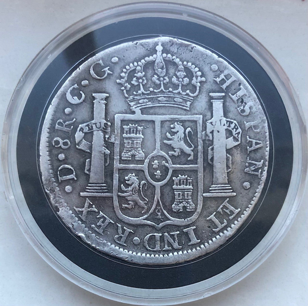 Reverse side of an 1821, 8-Reales silver coin