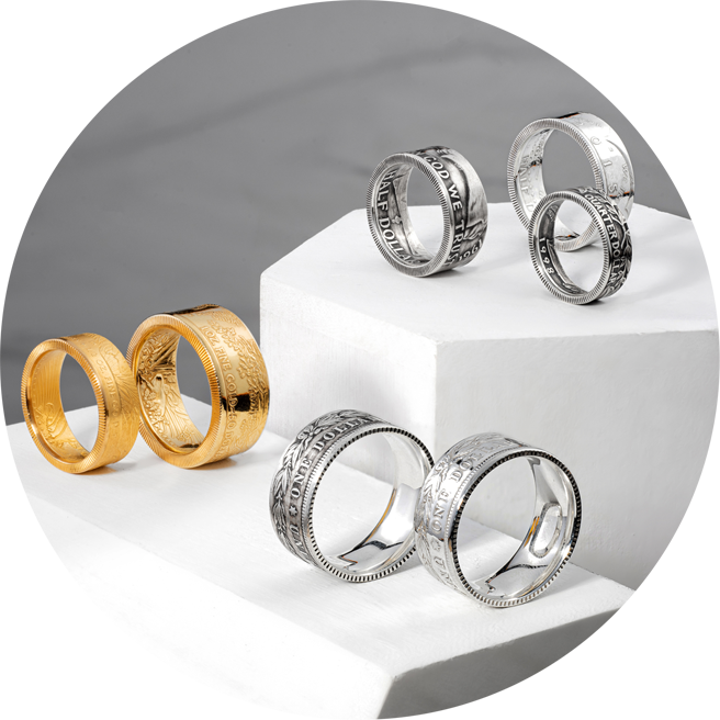 Various silver and gold rings made from coins.
